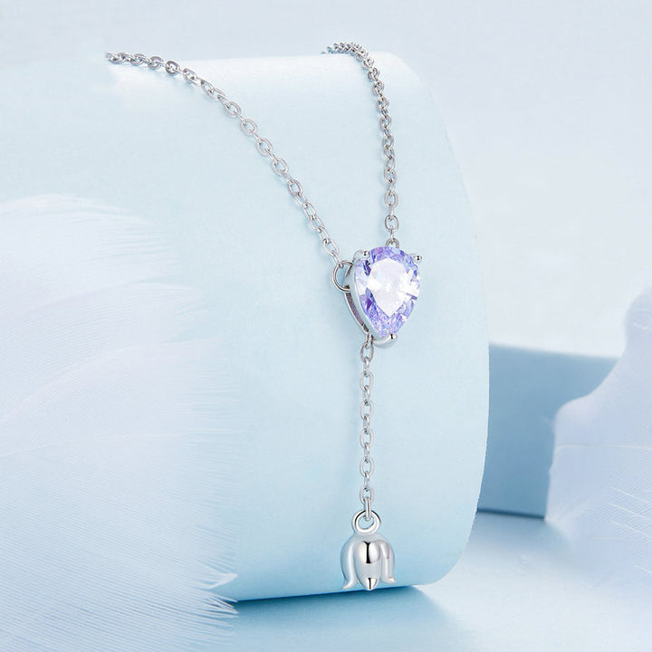Collier de lys de lariat vertical