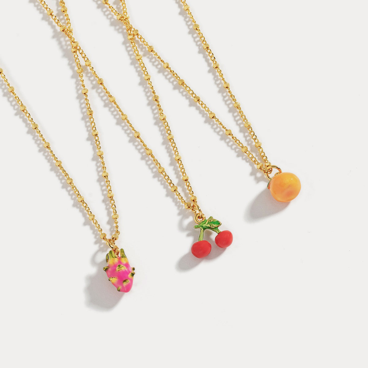 Selenichast fruit enamel necklace