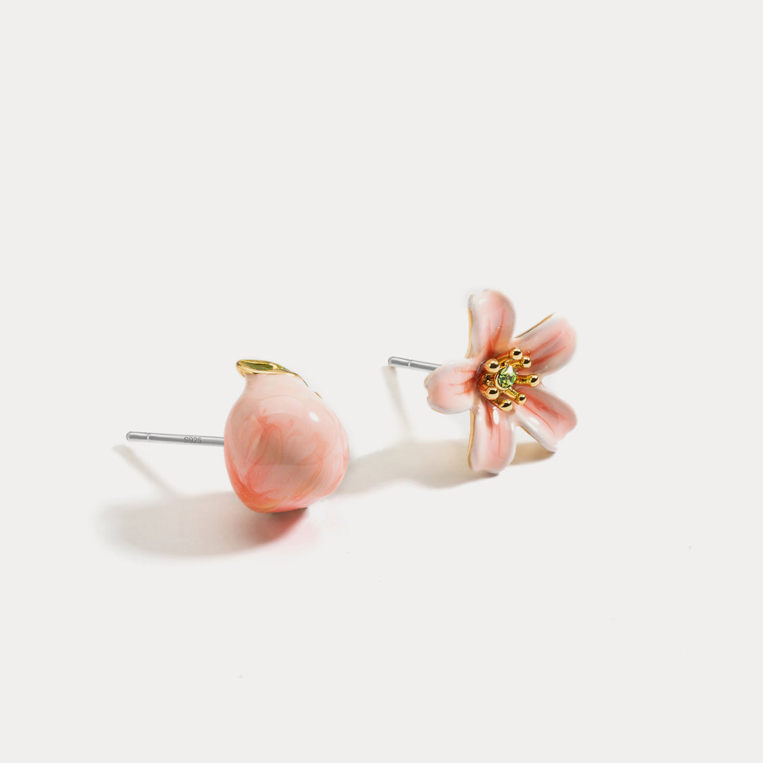 peach stud mismatch earrings