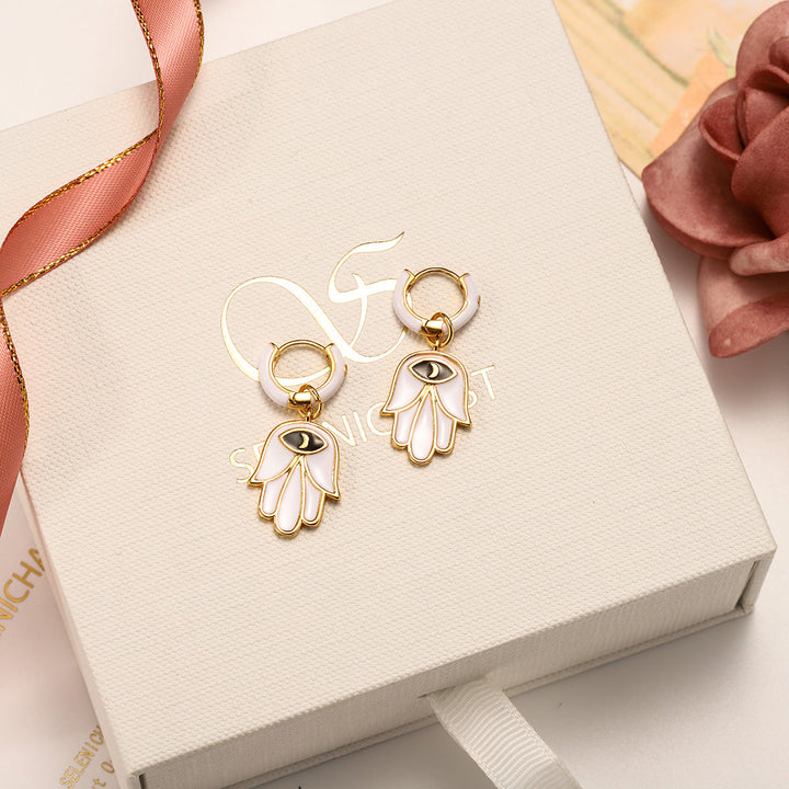 White Eye in Hand Drop Diamond Earrings