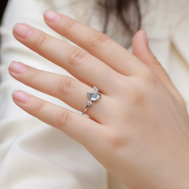 Saturn Halo Topaz Ring