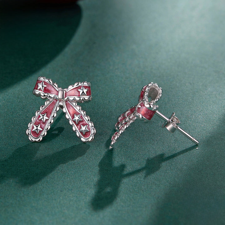 Silver Christmas Bow Star Earrings