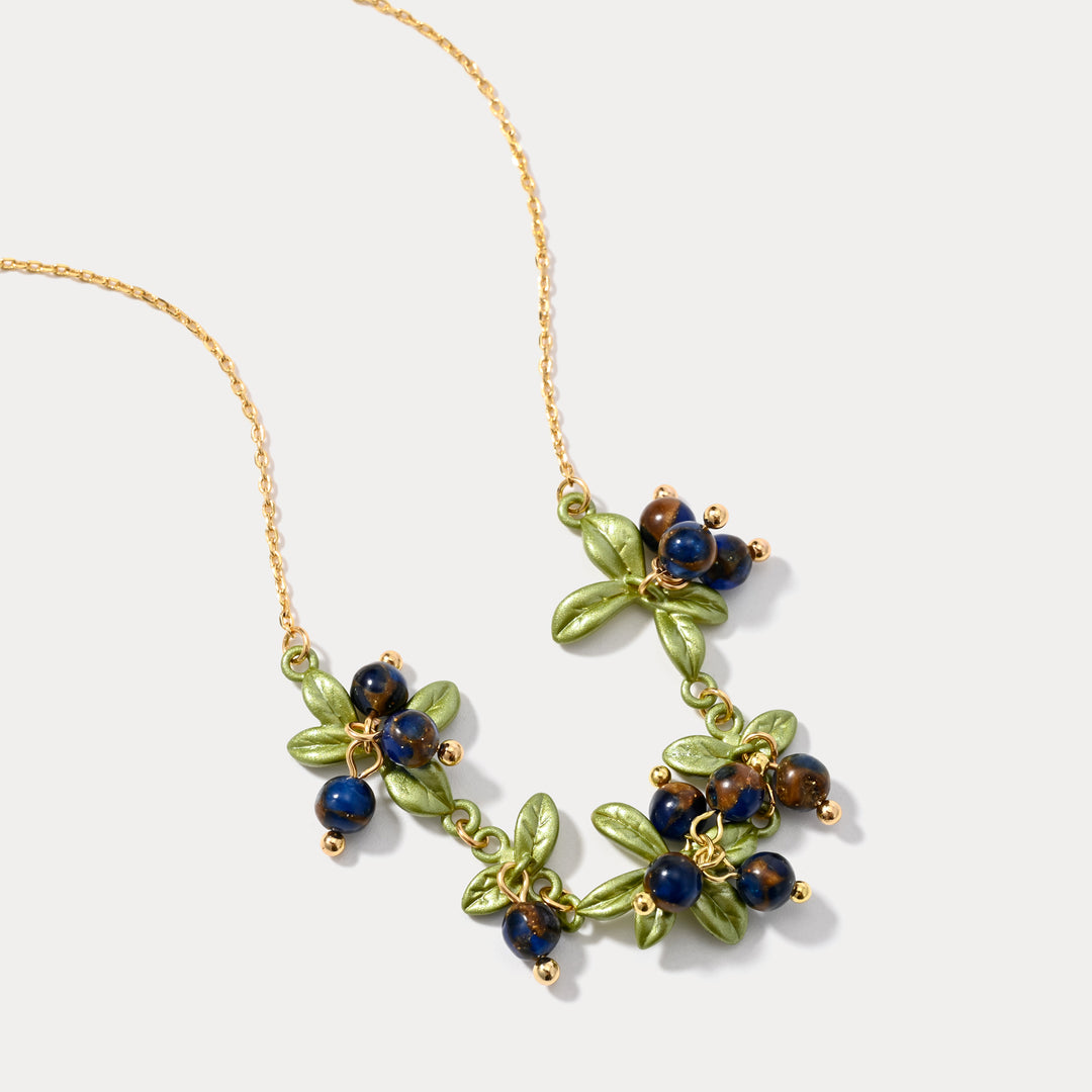Gold Necklace with Blue Stone