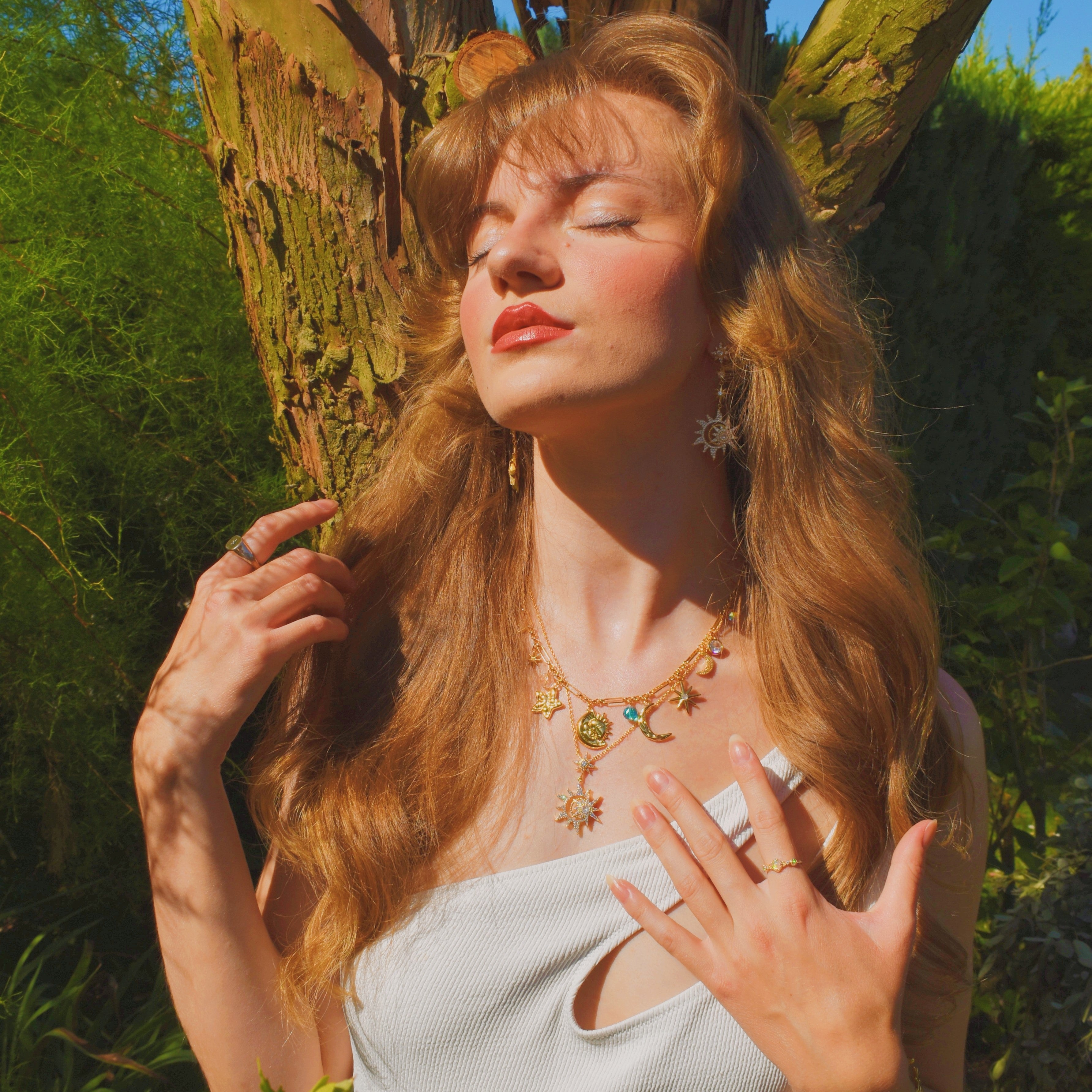 Collar de encanto de la estrella de la luna