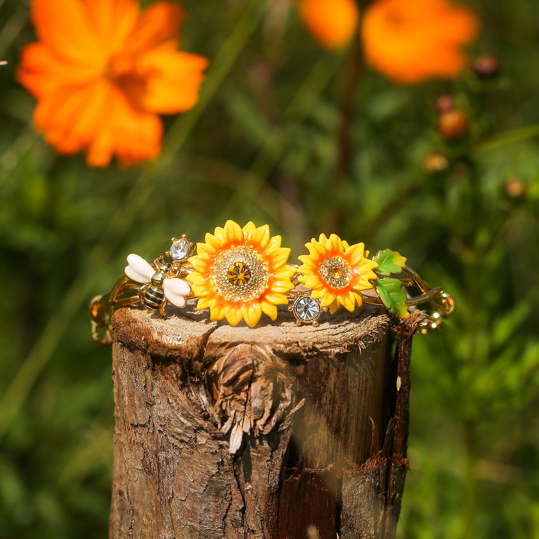 Girasole e braccialetto di api