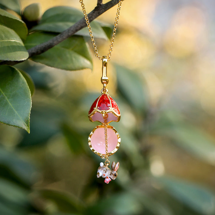 Collar de huevo de Pascua de conejo y rosa