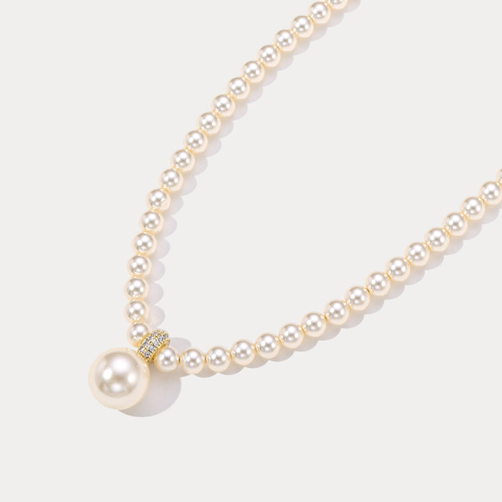 Collier pendentif perlé rond
