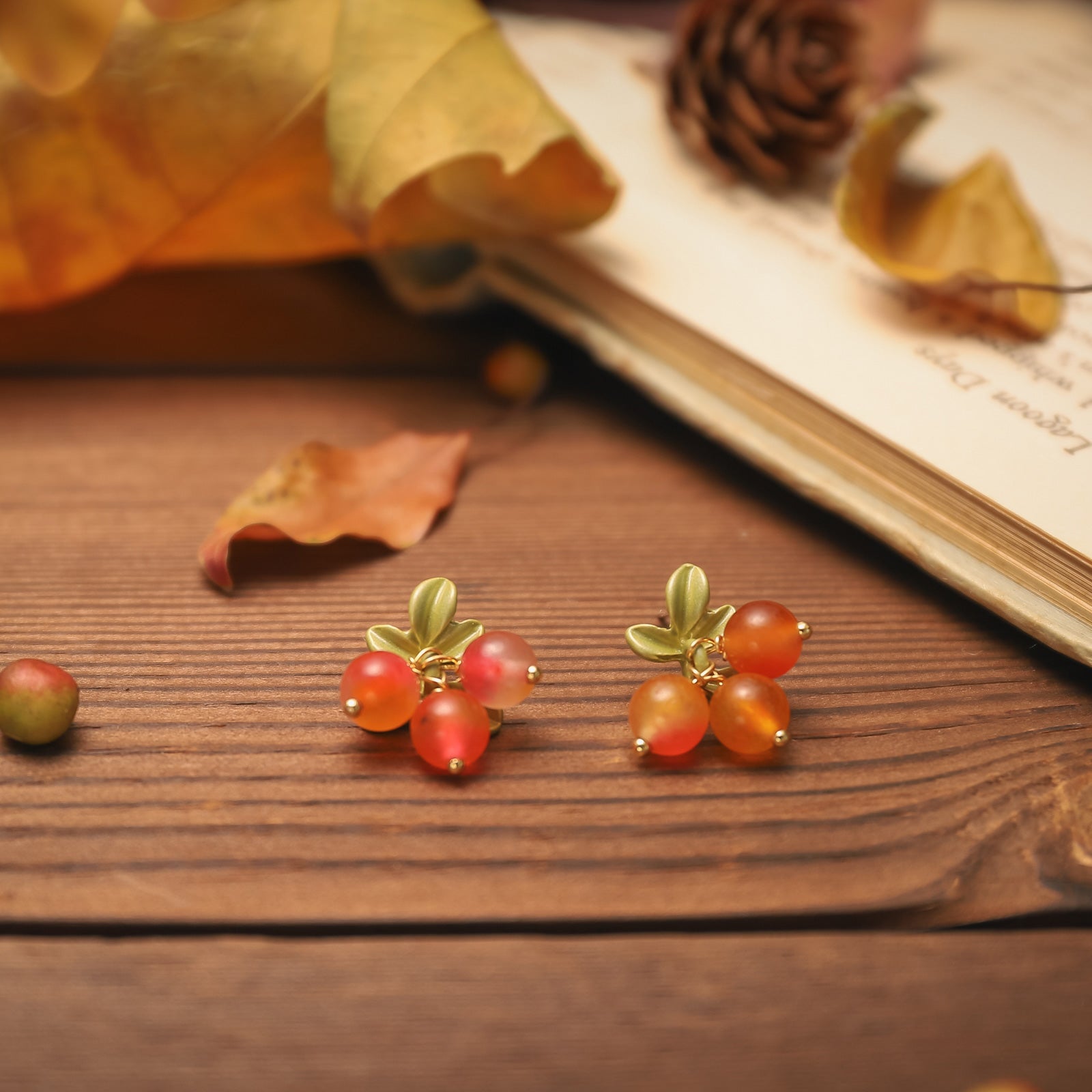 cranberry leaf stud earrings