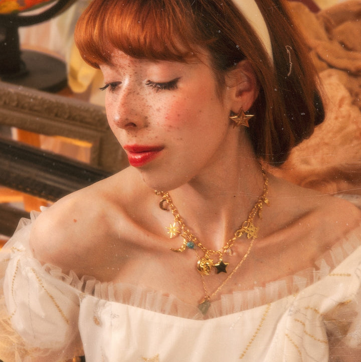 Collar de encanto de la estrella de la luna