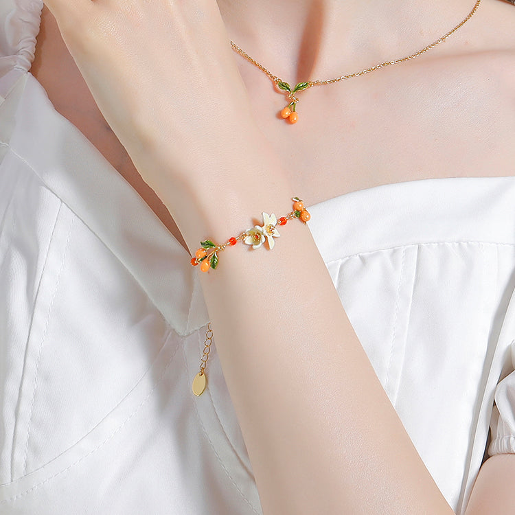 orange blossom bracelet and necklace