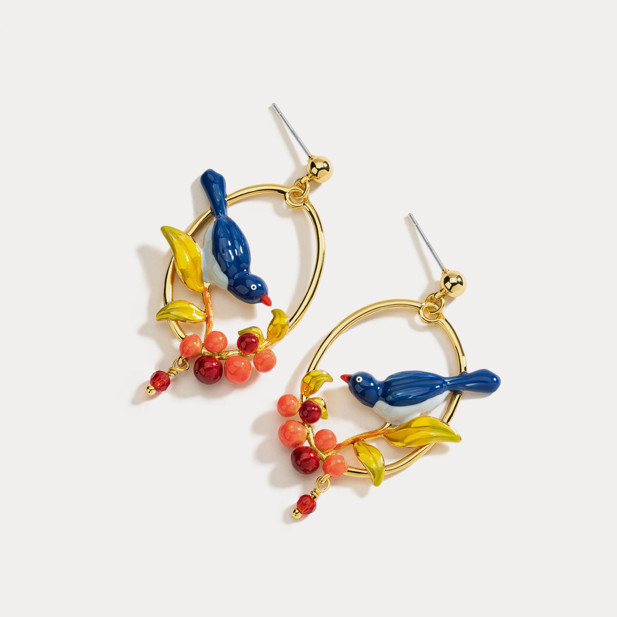 pair of lovebirds gold earrings