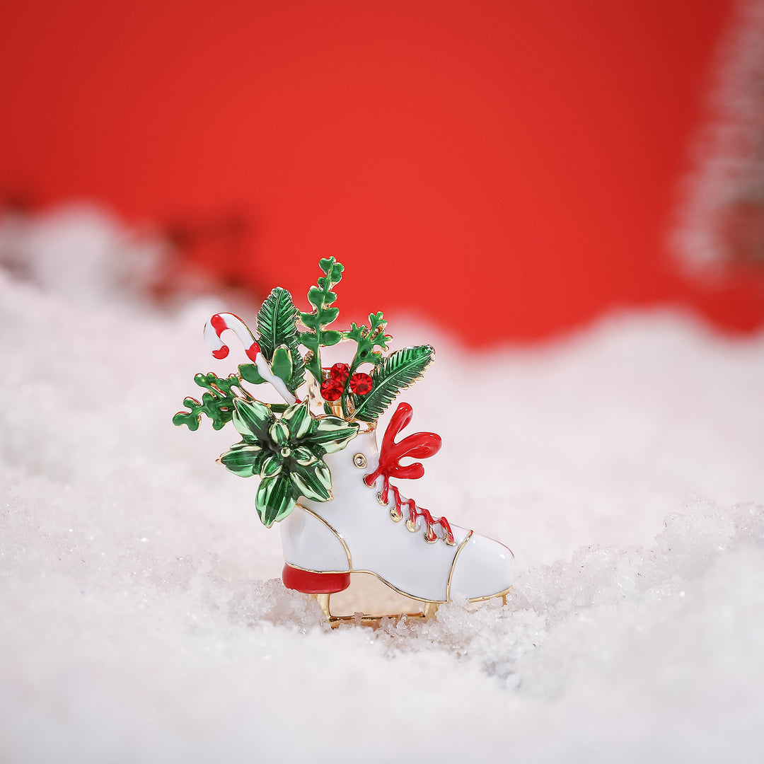 Broche de patinaje navideño