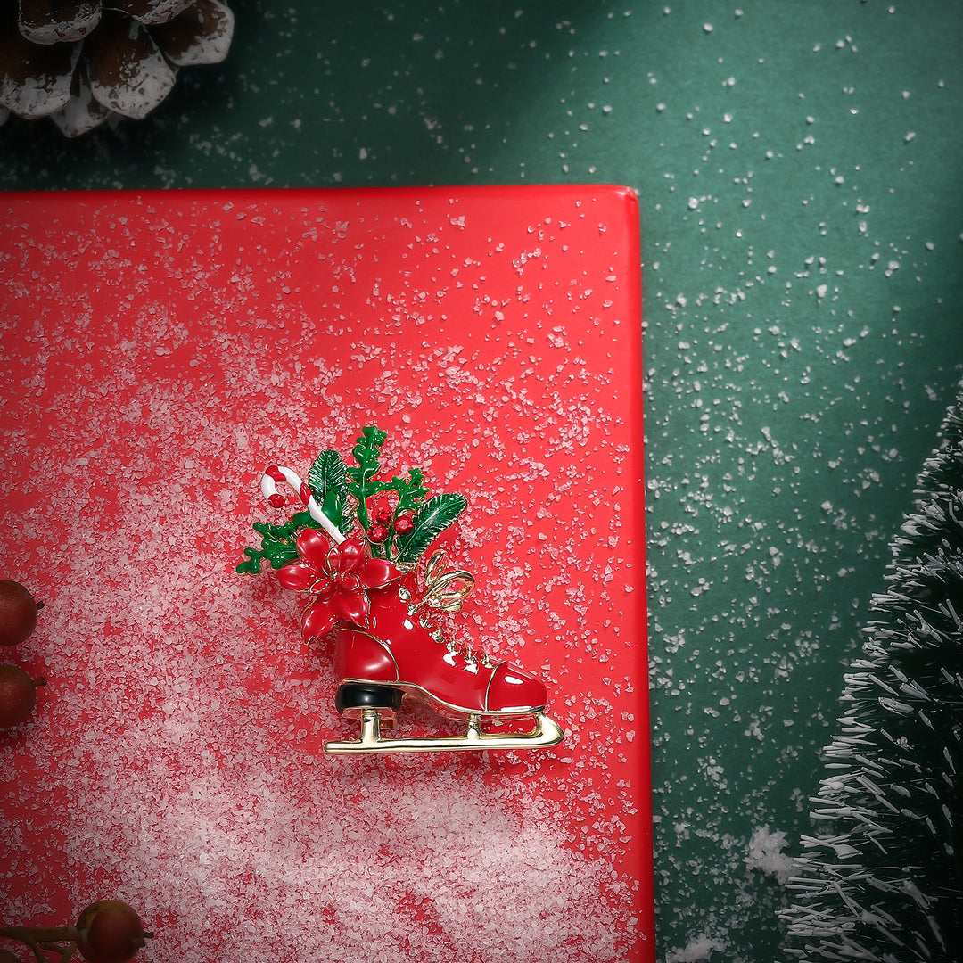 Broche de patinaje navideño