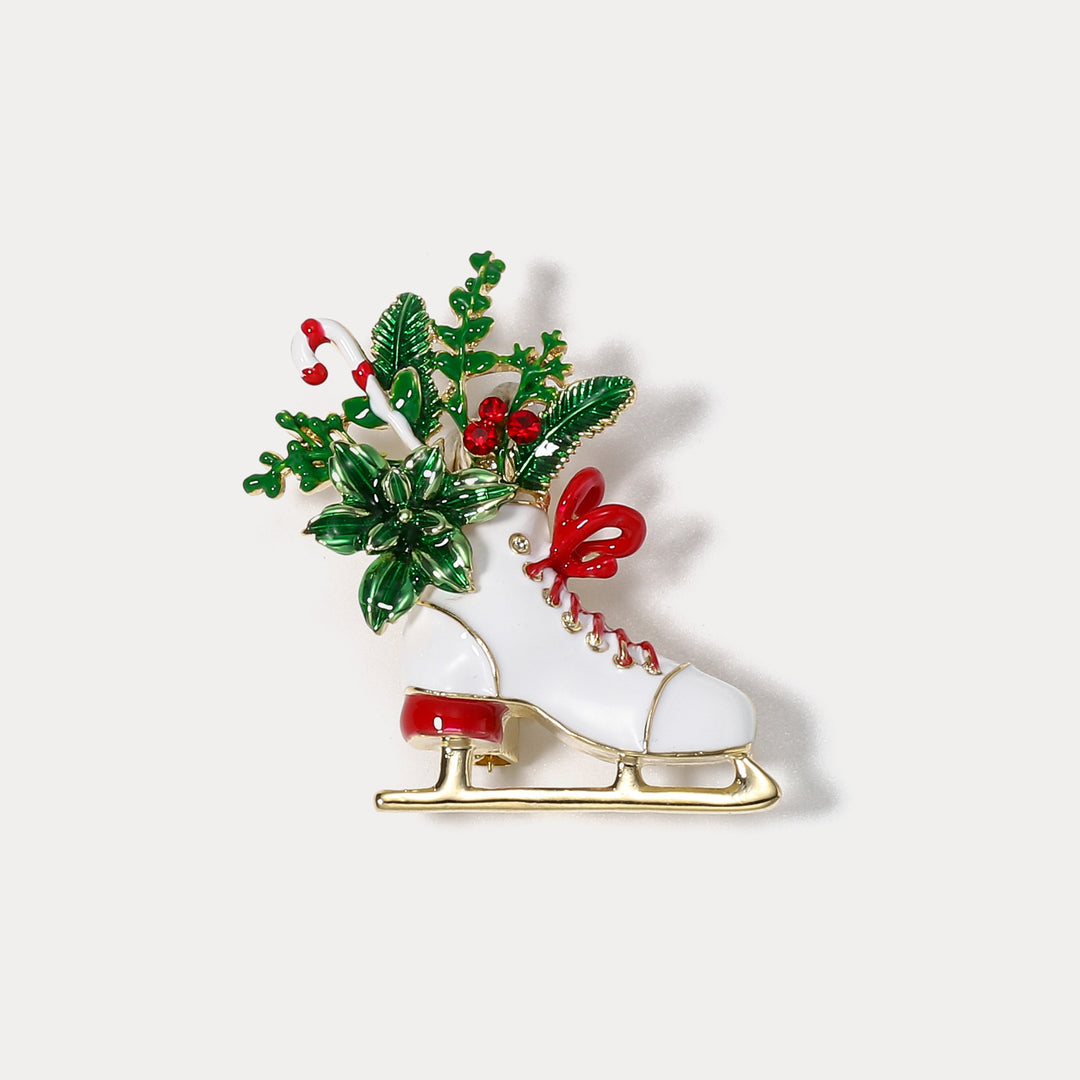 Broche de patinaje navideño