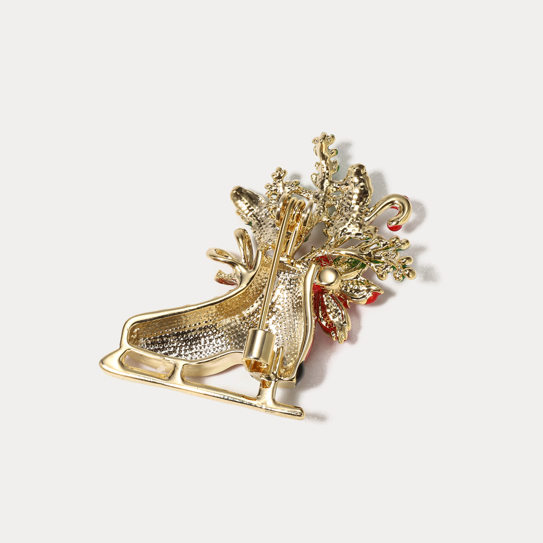 Broche de patinage de Noël